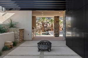 Doorway to property with a patio