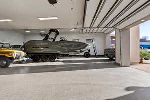 Garage with a carport and a garage door opener