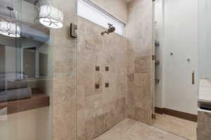 Bathroom with a tile shower