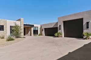 View of front of property with a garage