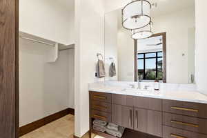 Bathroom with vanity and tile patterned flooring