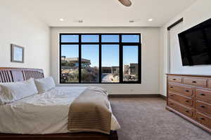 Bedroom with light carpet