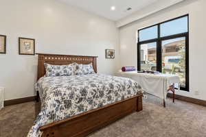 Bedroom featuring carpet