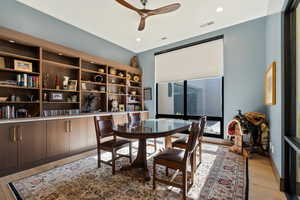 Dining space with ceiling fan and light hardwood / wood-style floors