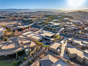 Birds eye view of property with a mountain view