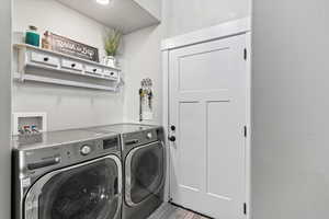 Clothes washing area with washer and dryer