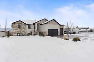 View of front of home with a garage