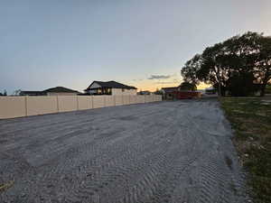 View of yard at dusk