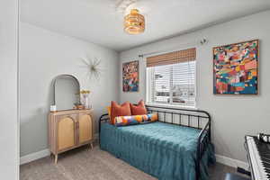 Bedroom featuring carpet floors