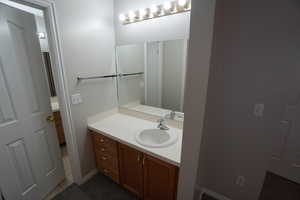 Bathroom with vanity and tile patterned flooring