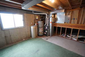 Basement with heating unit and gas water heater