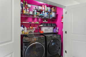 Laundry area featuring washer and clothes dryer