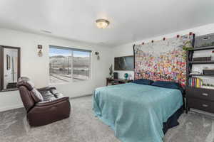 Bedroom featuring carpet flooring