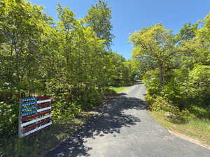 Entrance from Woodland Hills Dr to driveway