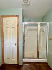 Master bathroom with shower and linen closet