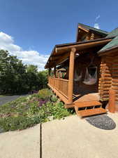 Side of home/deck with swings