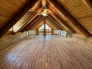 Loft featuring newly refinished hardwood floors