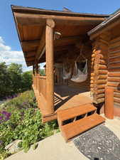 View of deck next to the garage with swings to enjoy the breathtaking views of the valley