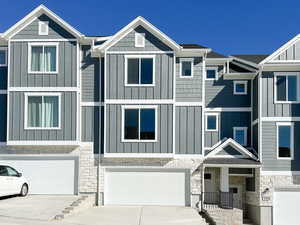 View of front of property with a garage