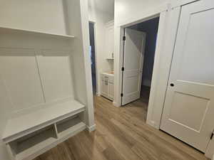 Mudroom featuring light wood-type flooring