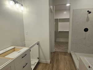 Bathroom with wood-type flooring