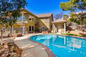 View of swimming pool with a patio area