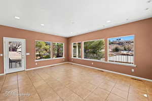 View of tiled spare room