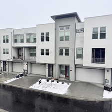 Townhome / multi-family property with a garage