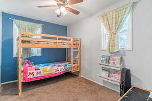 Bedroom with carpet floors and ceiling fan