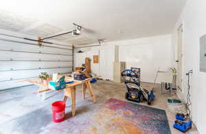 Garage with a garage door opener and sink