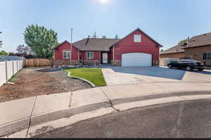 View of front of home featuring a garage