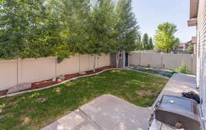 View of yard with a patio area