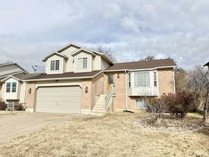 Tri-level home featuring a garage