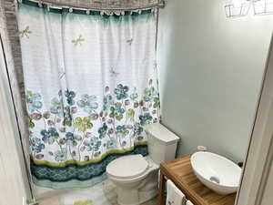 Bathroom featuring vanity and toilet