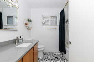 updated bathroom upstairs with quartz counters