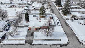 Snowy aerial view with a residential view