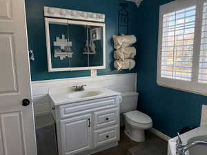 Bathroom with vanity and toilet