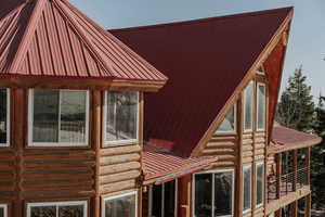 View of home's exterior featuring metal roof