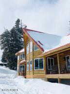 View of snow covered property