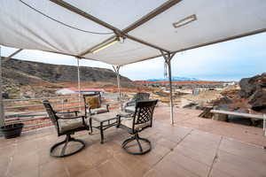 View of patio featuring a mountain view