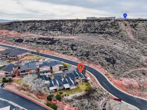 Birds eye view of property with a residential view