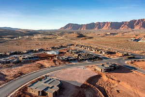 Birds eye view of property with a mountain view