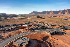 Birds eye view of property with a mountain view