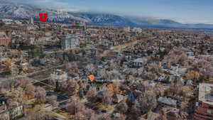 Birds eye view of property with a mountain view