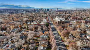 Birds eye view of property with a mountain view