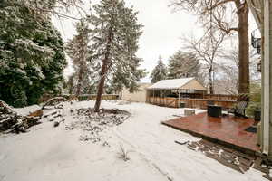 View of yard layered in snow