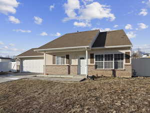 View of front of home with a garage