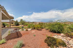 View of yard with a pergola