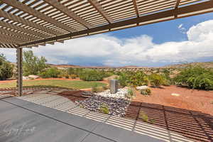 View of patio with a pergola