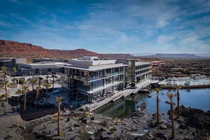 Back of Resort Center view of lake and pools